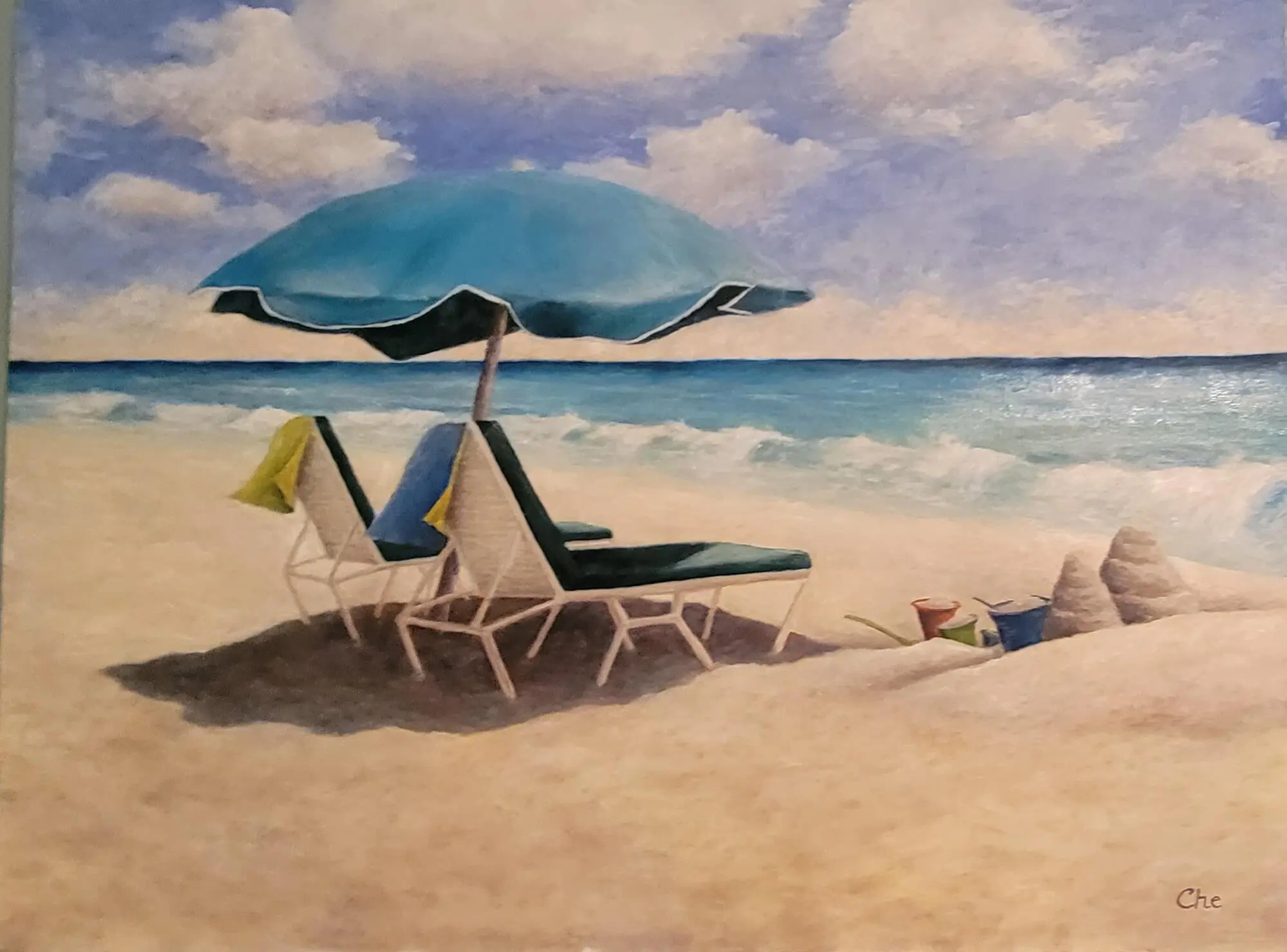 Relaxing seaside scene with chairs and umbrella